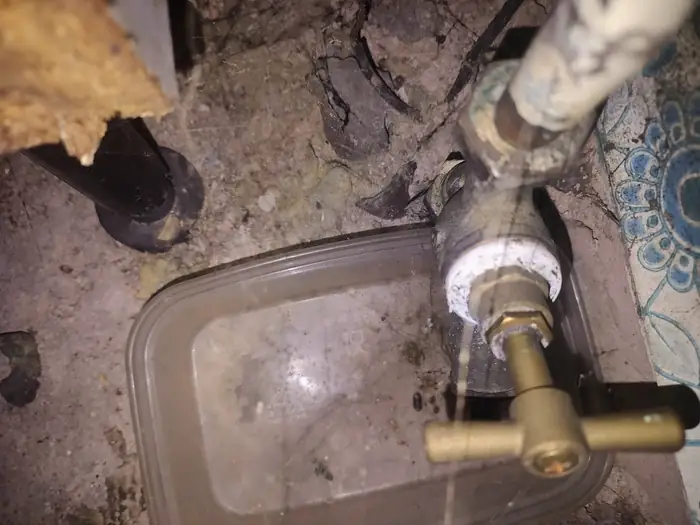 Leaking stopcock under floor repair